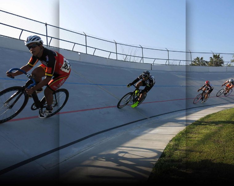 Four riders on the banking, around 2014. The background photograph of the club's previous website.