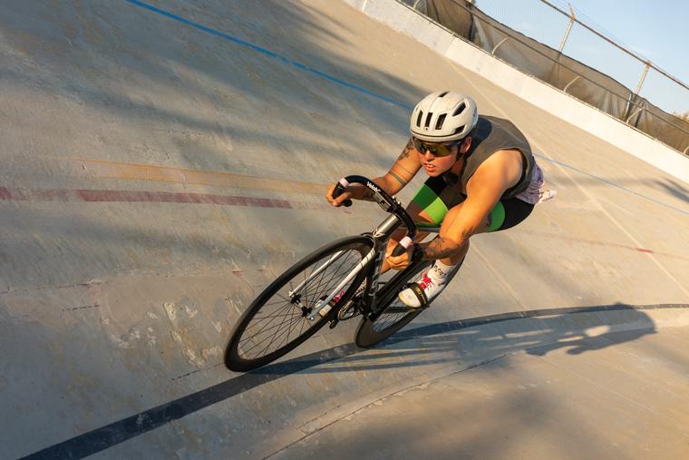 Low and wide as a rider drops off the banking.