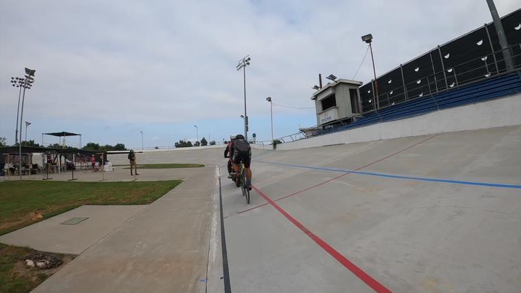 Past the grandstand behind the motor. Frame from video.
